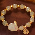 Green Lucky Jade adjustable bracelet with fu character and hare charm on black hand style band