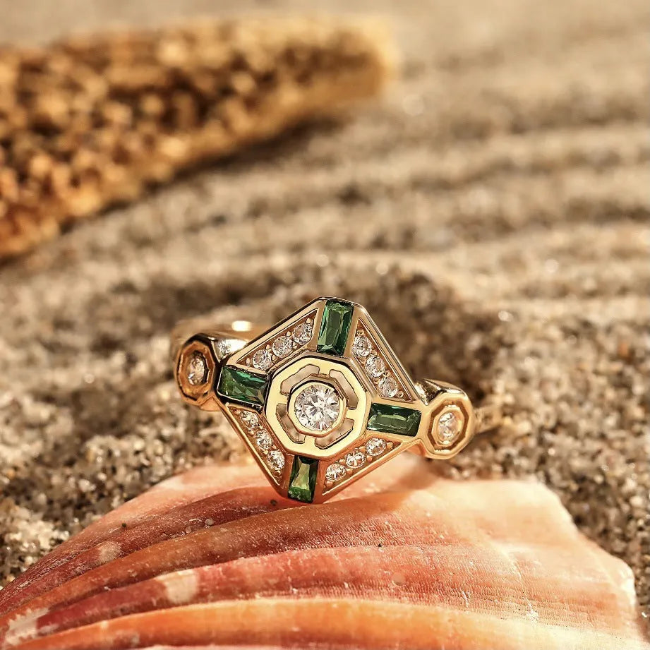 Square-cut lvzuan coloured gemstone ring on a silver-toned electroplated band.