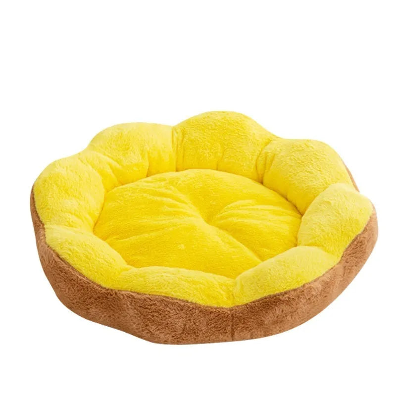 A round, thick rabbit plush cat bed with a high rim, shown in a brown gray colour, suitable for a cat to sleep in.