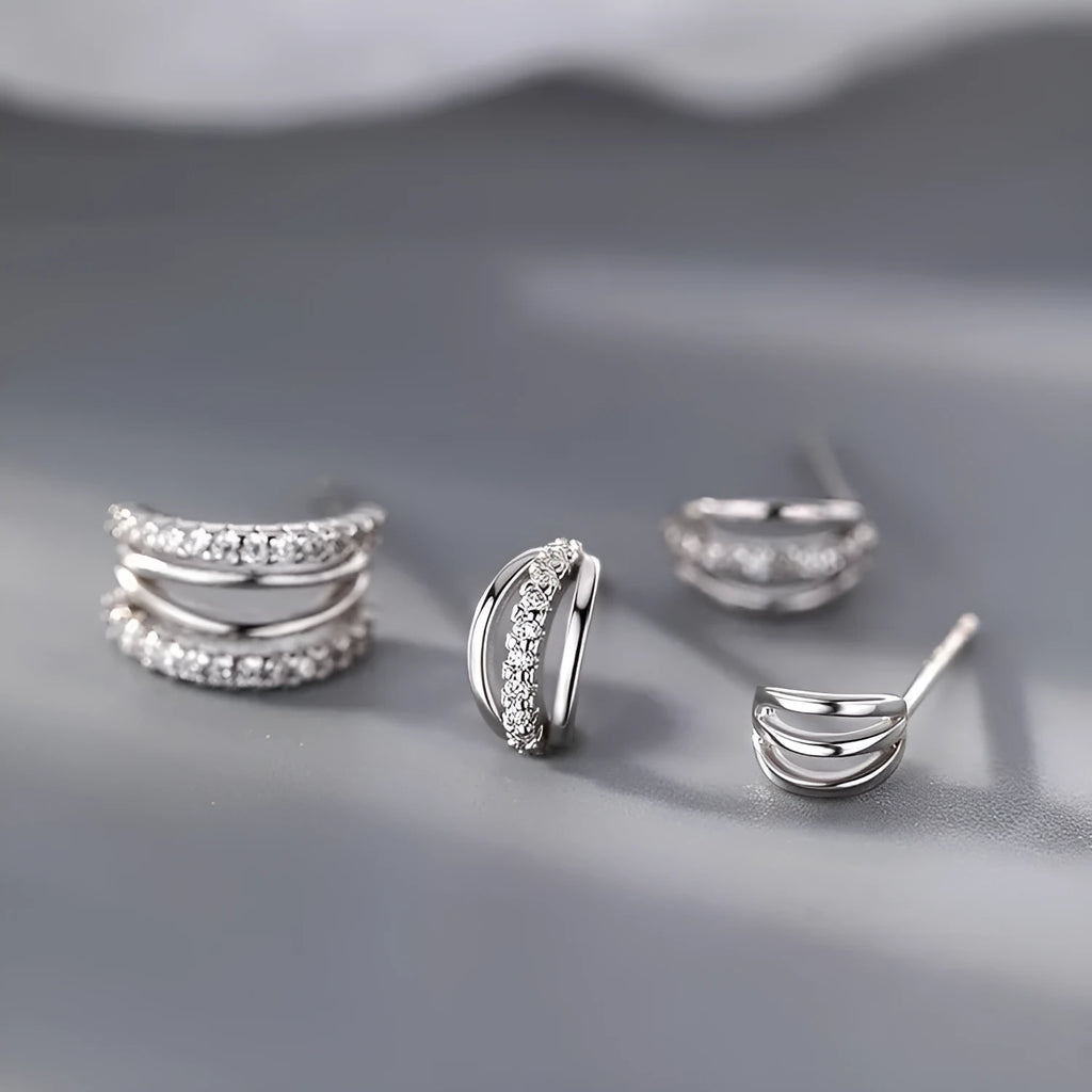 Geometric 925 silver stud earrings shown in three size options with silver needle posts