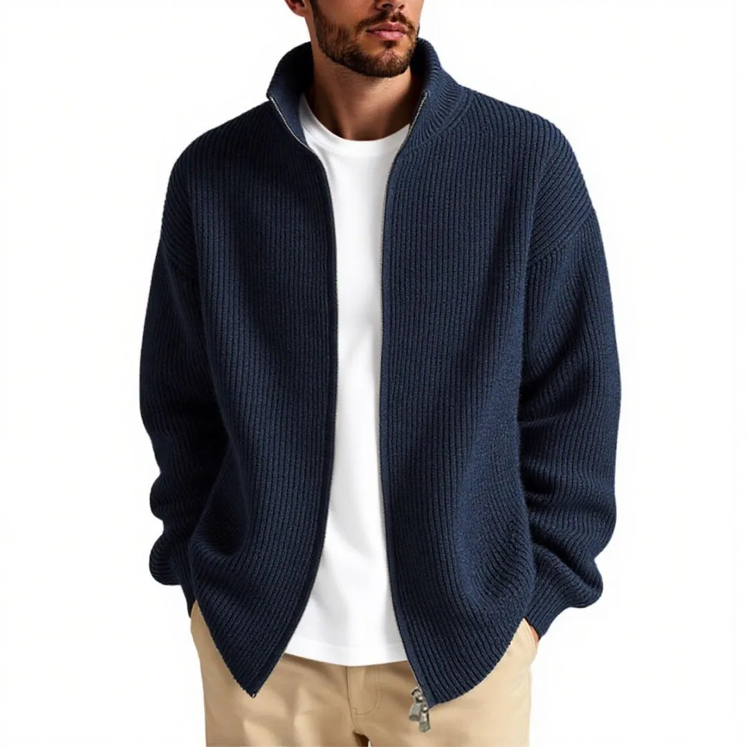 Man wearing a loose-fit grey cardigan sweater, a casual base layer for leisure wear.