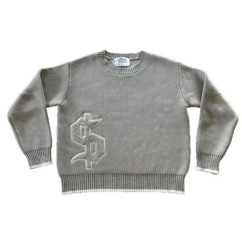 Grey loose-fitting jacquard knitwear coat with long sleeves on a hanger.