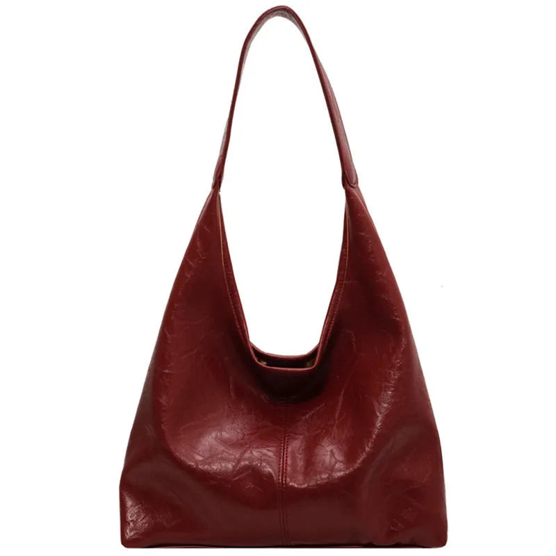 Soft PU leather casual shoulder bag with sandwich pocket in multiple colour options.