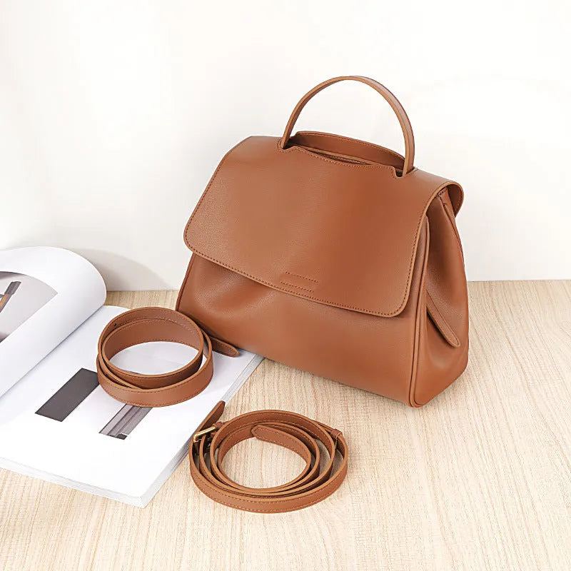 Genuine leather women's shoulder messenger bag in black, soft two-layer cowhide, horizontal square shape with sewing thread detail