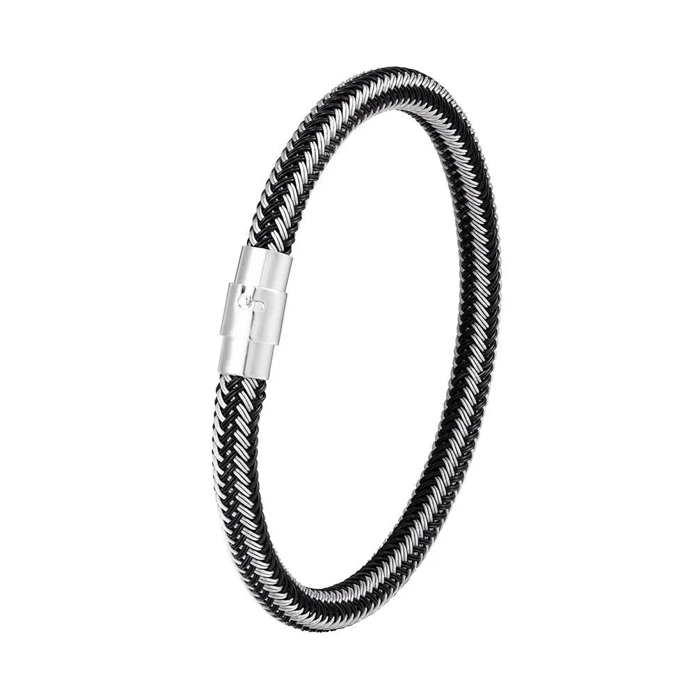 Geometric titanium steel wire bracelet with a magnetic clasp closure on a wrist.