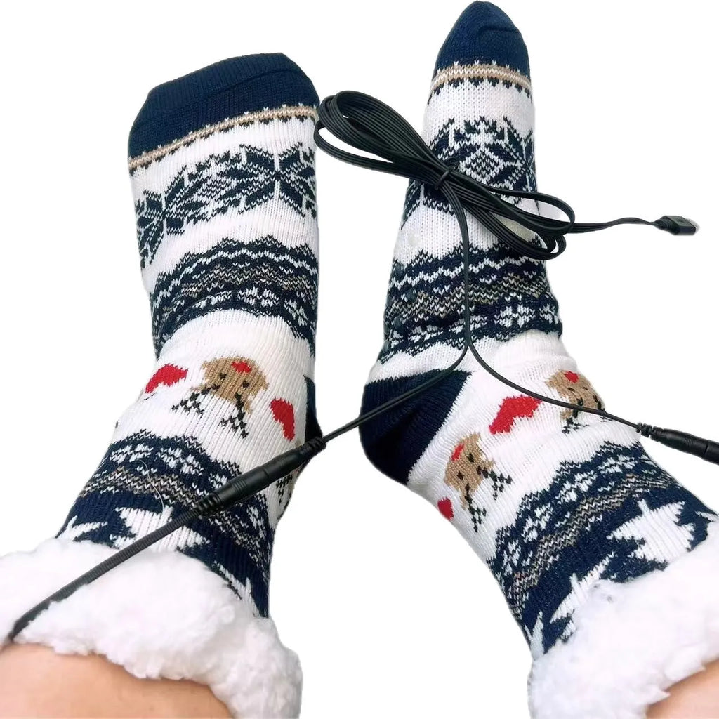 USB electric heating thickened room socks in red Santa Claus jacquard pattern on a white background