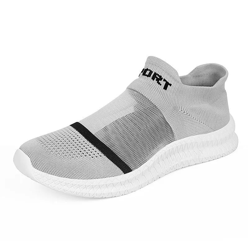 A pair of khaki Flyknit sock shoes with lace closure and a low-top design on an MD sole.