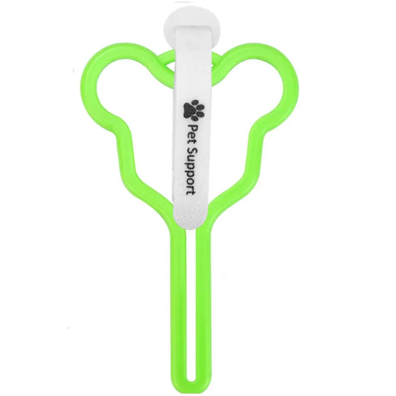 A hands-free dog poop bag holder with a hook and loop fastener strap, shown attached to a dog leash.