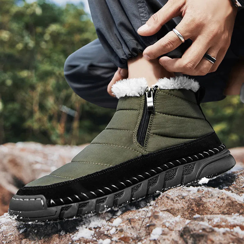 Men's plus size solid colour snow boot with round toe and flat heel on a non-slip rubber sole.