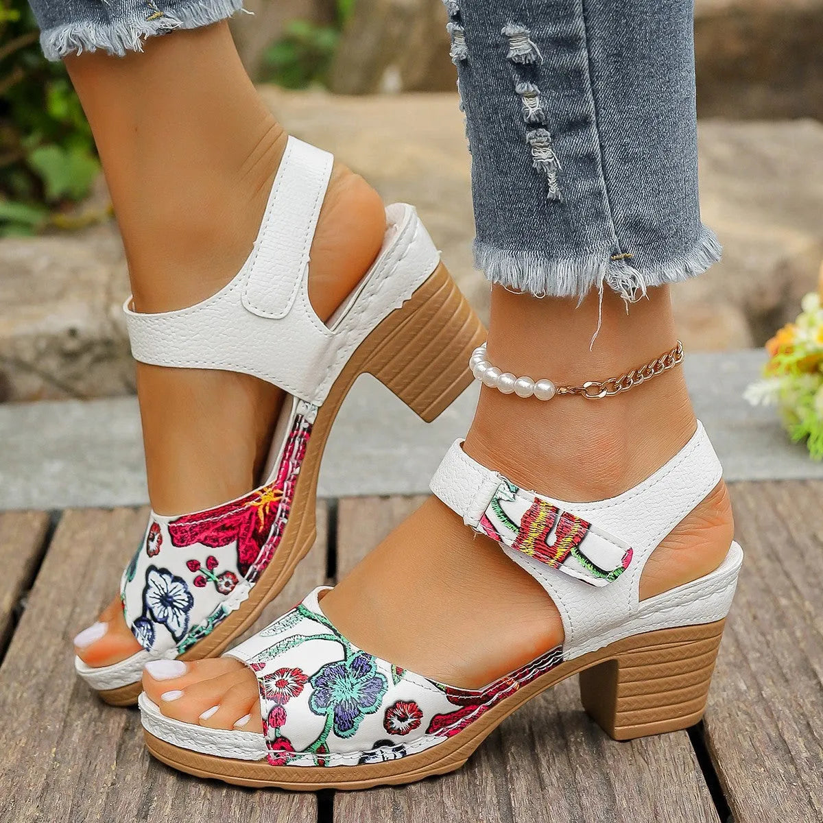 White women's high heel sandals with a Velcro buckle strap and rubber sole