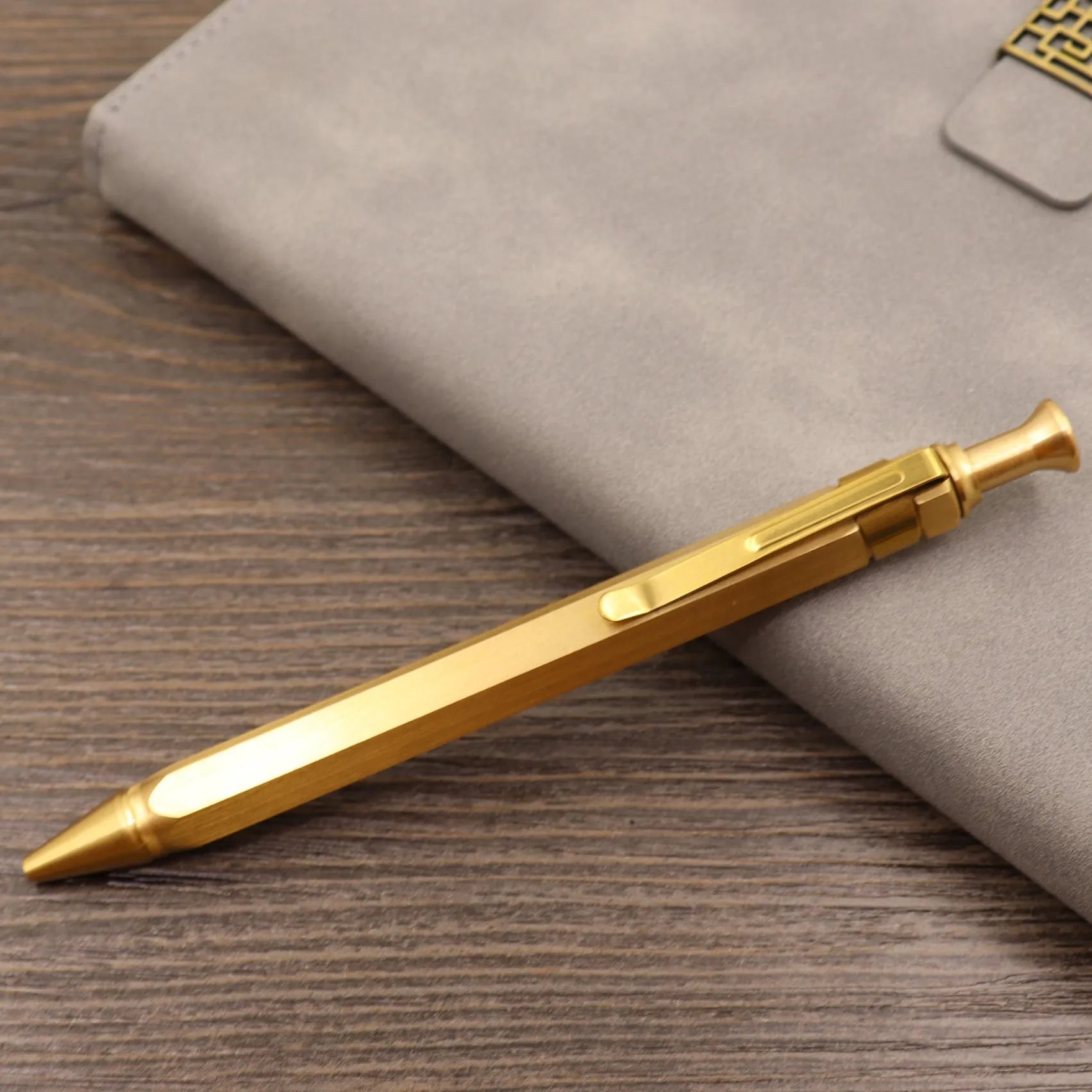 Brass tactical pen with retro colour finish and press mechanism