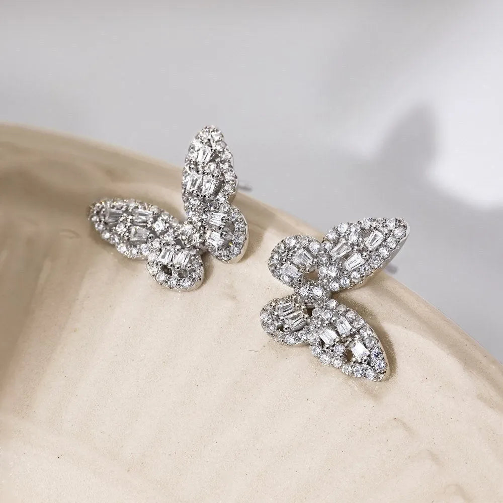 S925 sterling silver stud earrings with zircon inlay, platinum electroplated finish, geometric shape