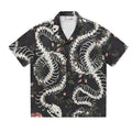 Short sleeve loose fit Cuban collar shirt with snake bone and floral printed pattern in various colours.