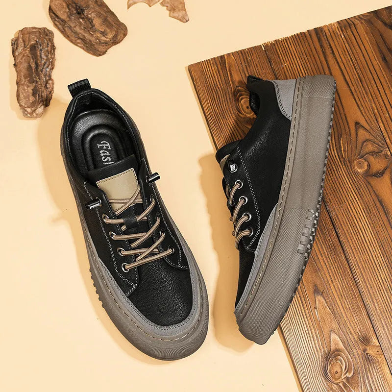 Men's black round toe leather shoes with lace-up front and rubber sole