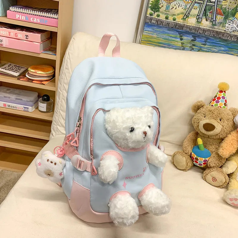 Nylon school backpack with curved shoulder straps in macaron colours including yellow pink