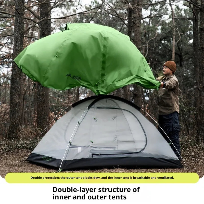 Portable lightweight hiking tent for 1-2 people with aluminium poles, field green colour, pitched outdoors