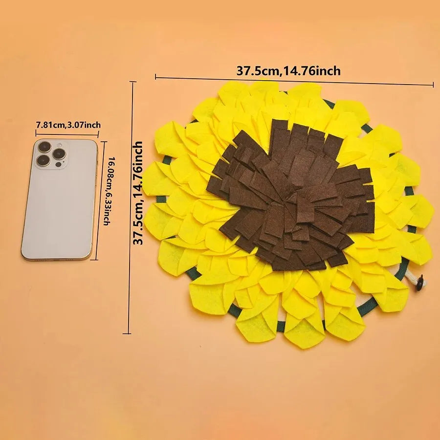 Yellow sunflower-shaped dog snuffle mat with fleece surface and a rope for hanging
