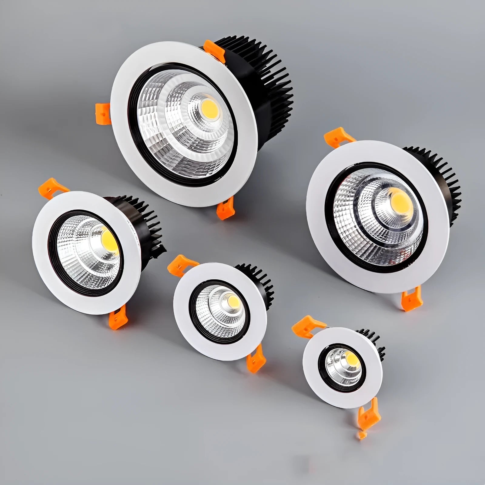 Modern aluminium recessed LED ceiling spotlight with anti-glare design, shown in white and black trim finishes.