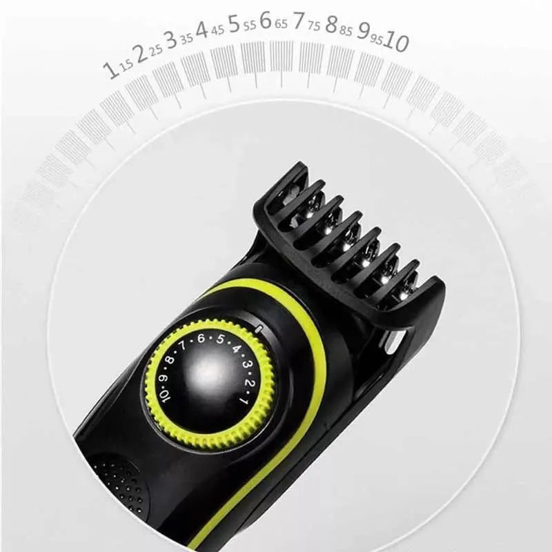 Black KM-696 rechargeable electric hair clipper set with USB cable and stainless steel blades.