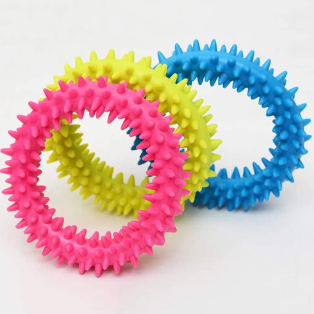 Blue spiky circle ring dog chew toy made from TPR for cleaning teeth and bite training.
