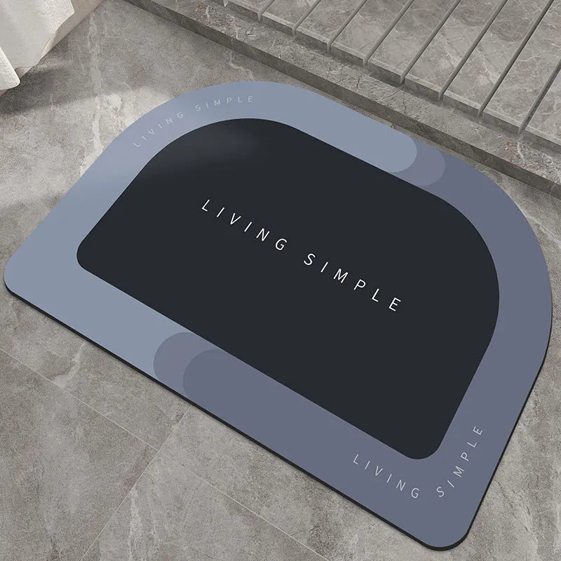 Super absorbent oval bath mat in grey with non-slip rubber bottom, 40x60cm