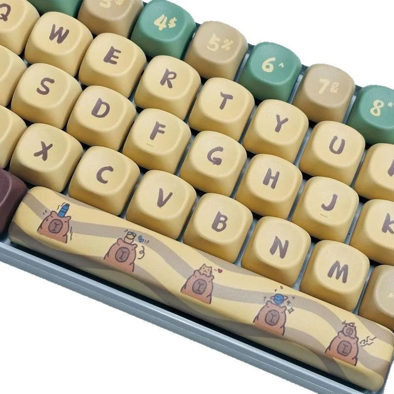 Capabala Girl MOA style 130-piece ABS plastic keycap set for mechanical keyboards, spread out showing alphanumeric and modifier keys.