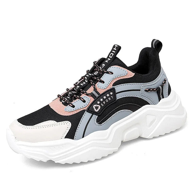 Women's white casual sports shoes with mesh upper, thick PU sole, and a buckle fastening.