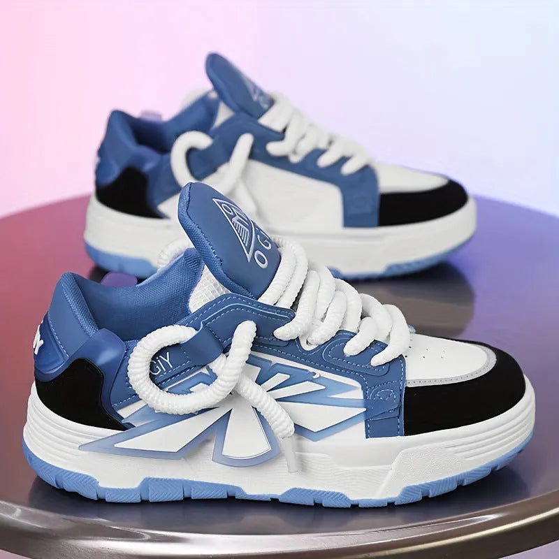 Men's white chunky sneakers with thick rubber sole and cartoon pattern details