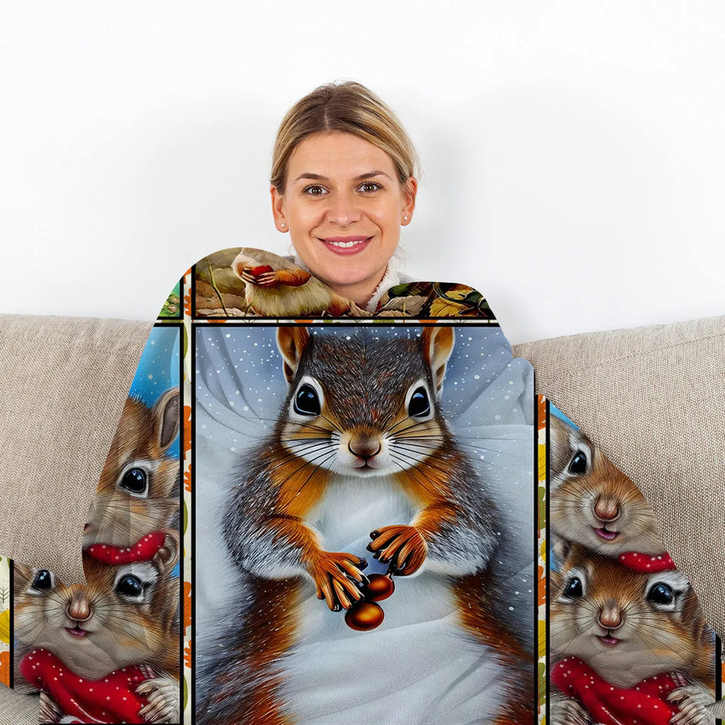 Yellow flannel blanket with white-bellied squirrel print, 130x150cm, folded on sofa