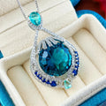 Blue fireworks-cut crystal geometric pendant necklace on water wave chain