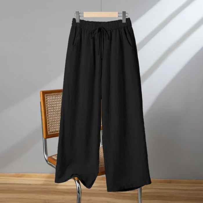 Women's straight-leg casual trousers with elastic waist and drawstring detail in apricot colour