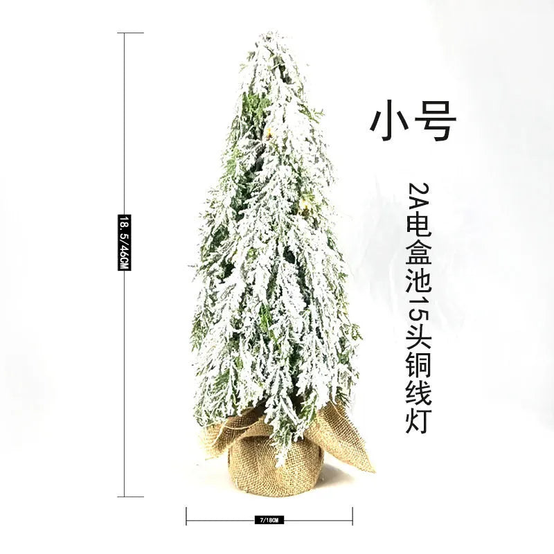 24-inch green artificial Christmas tree with integrated lights and PE snow sprayer decoration
