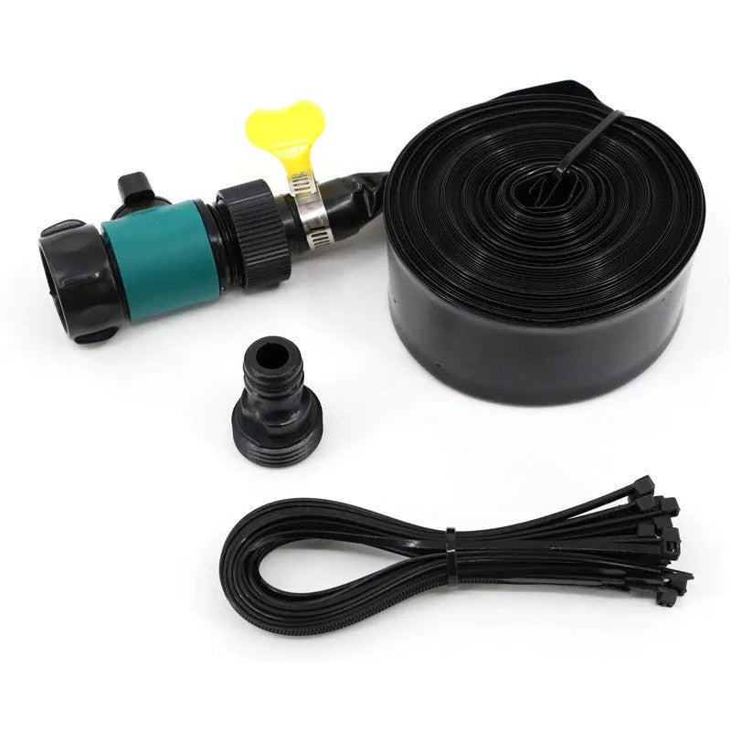 Blue portable PVC garden sprinkler with solar water cooling feature laid out on grass.