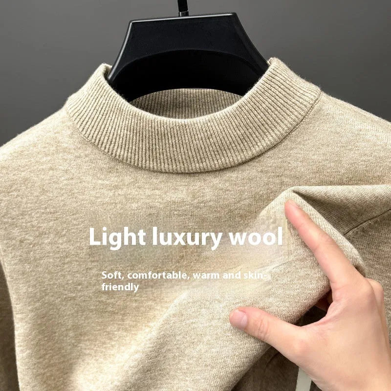 Men's fine wool half turtleneck sweater in a solid colour, showing long sleeves and regular fit.
