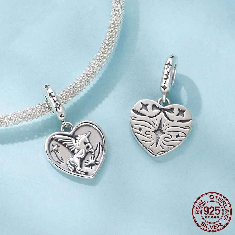 S925 sterling silver love heart bead with pearlescent finish, 2.3cm high, 1.3cm wide, 0.45cm aperture