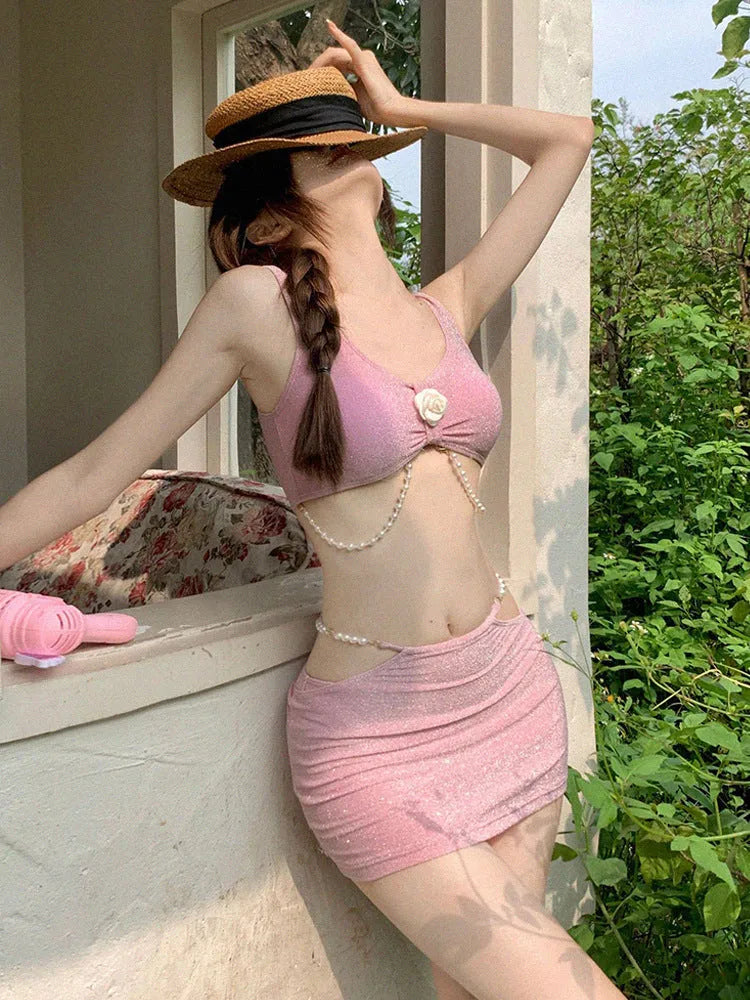 Women's three-piece polyester bikini set in pink or black with sleeveless briefs style for swimming and hot springs