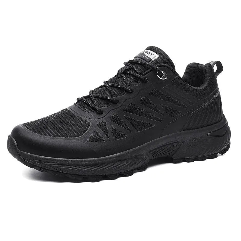 Plus size men's black and orange outdoor running shoe with mesh upper and lace-up front.
