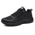 Plus size men's black and orange outdoor running shoe with mesh upper and lace-up front.