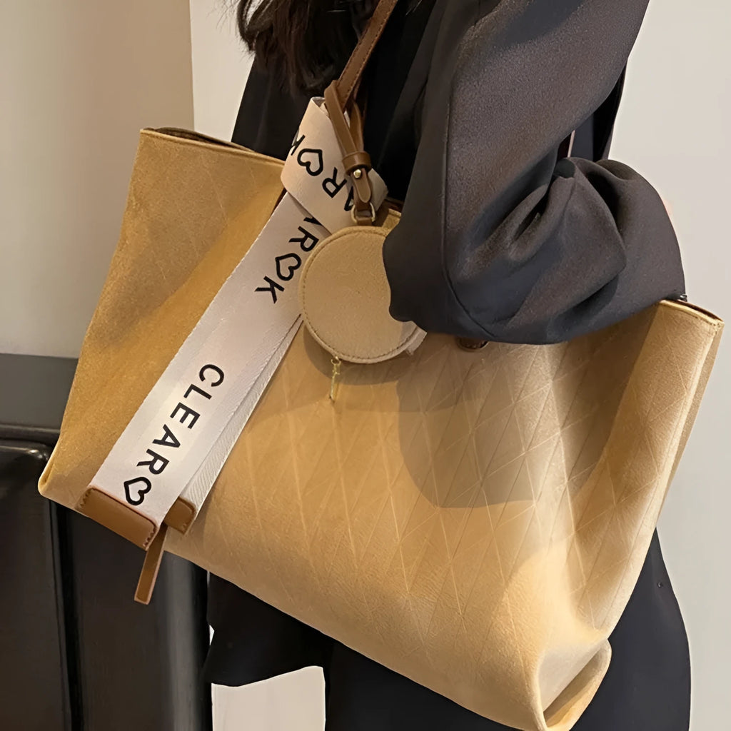 Large soft polyester shoulder tote bag in horizontal square shape with zippered internal compartment