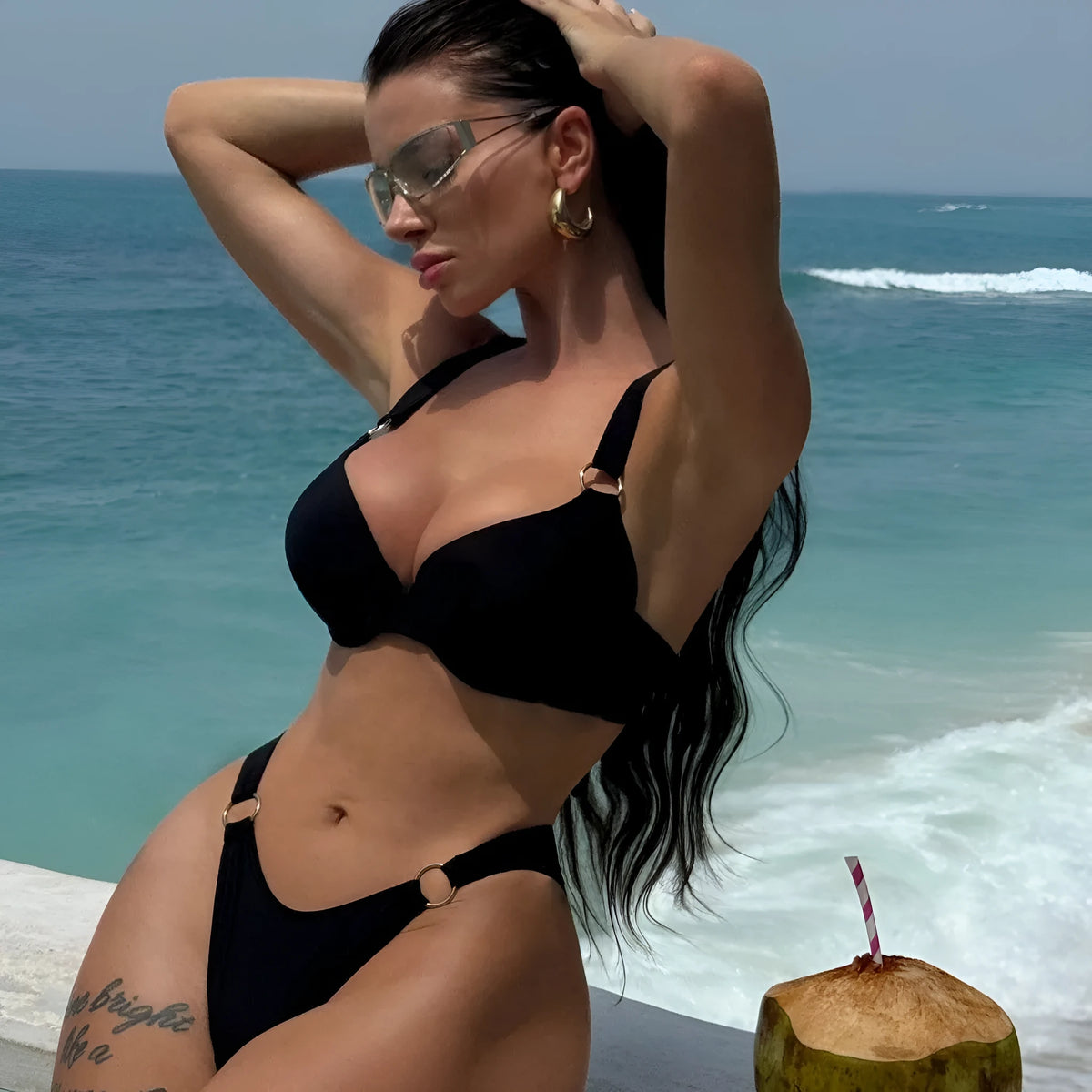 Women's black nylon two-piece bikini set in sizes S, M and L for swimming and wading
