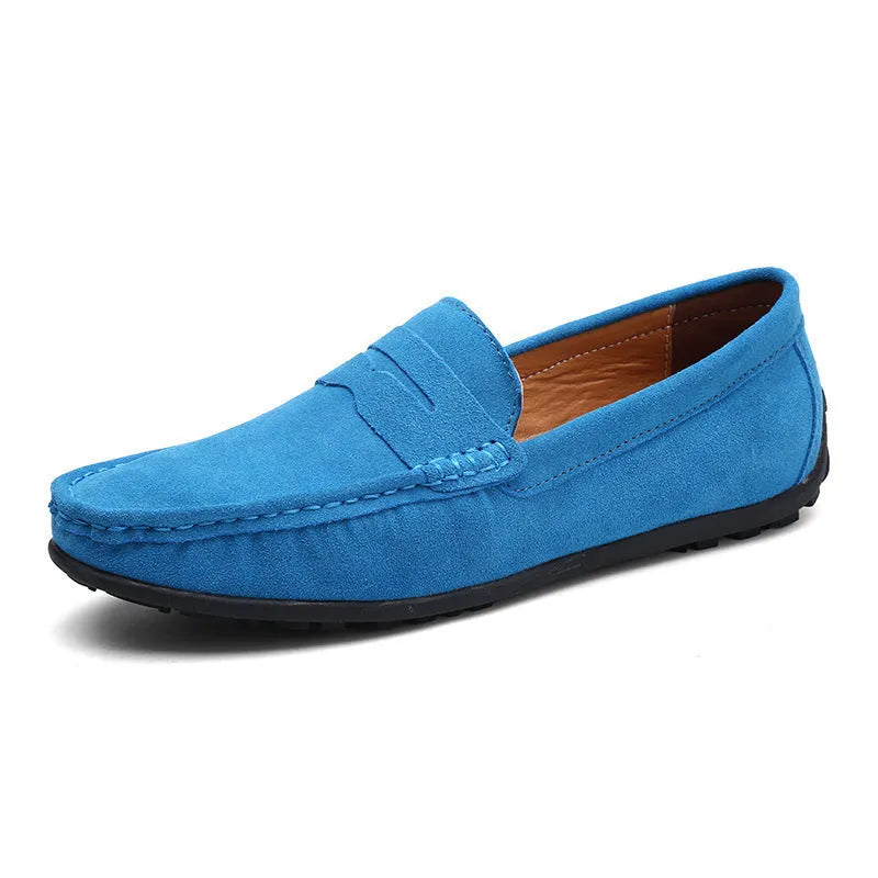 Men's brown suede Gommino casual loafers with a round toe and flat rubber sole.