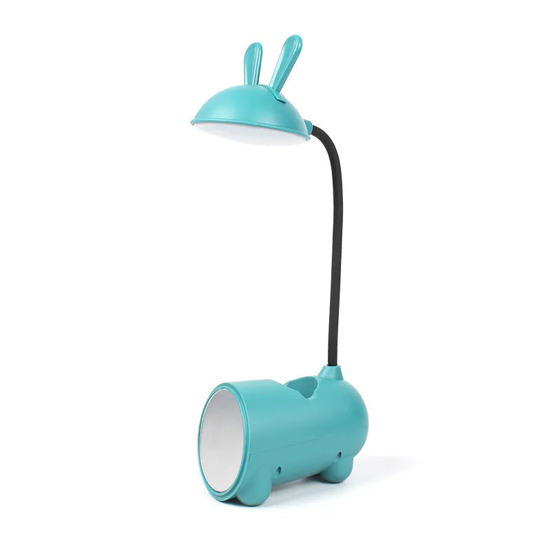 Cartoon-themed desktop table lamp with integrated pen container in green colour
