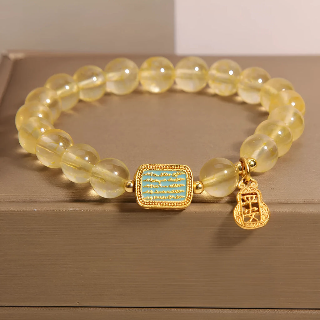 Women's natural citrine crystal bracelet with rhinestone decorative elements