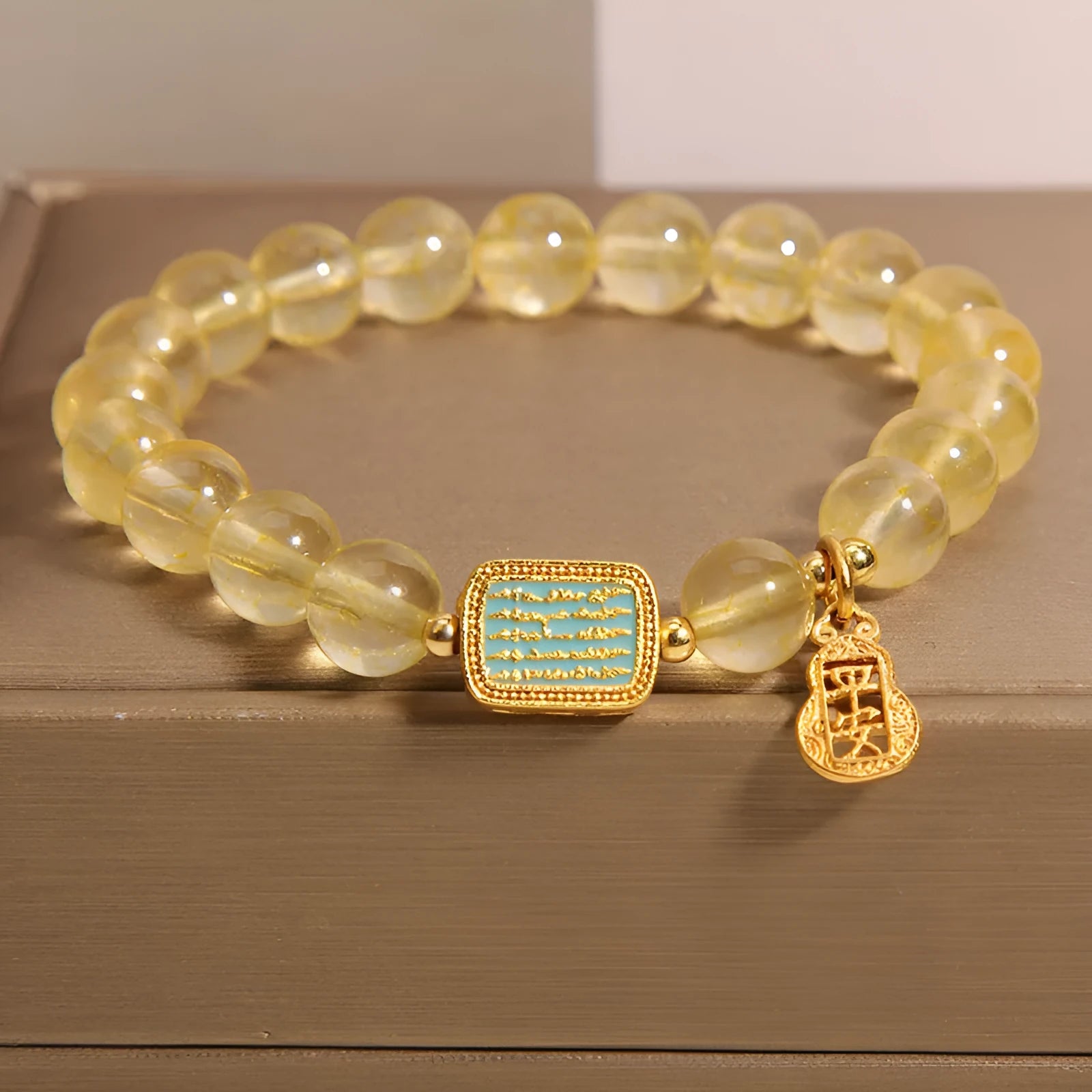 Women's natural citrine crystal bracelet with rhinestone decorative elements