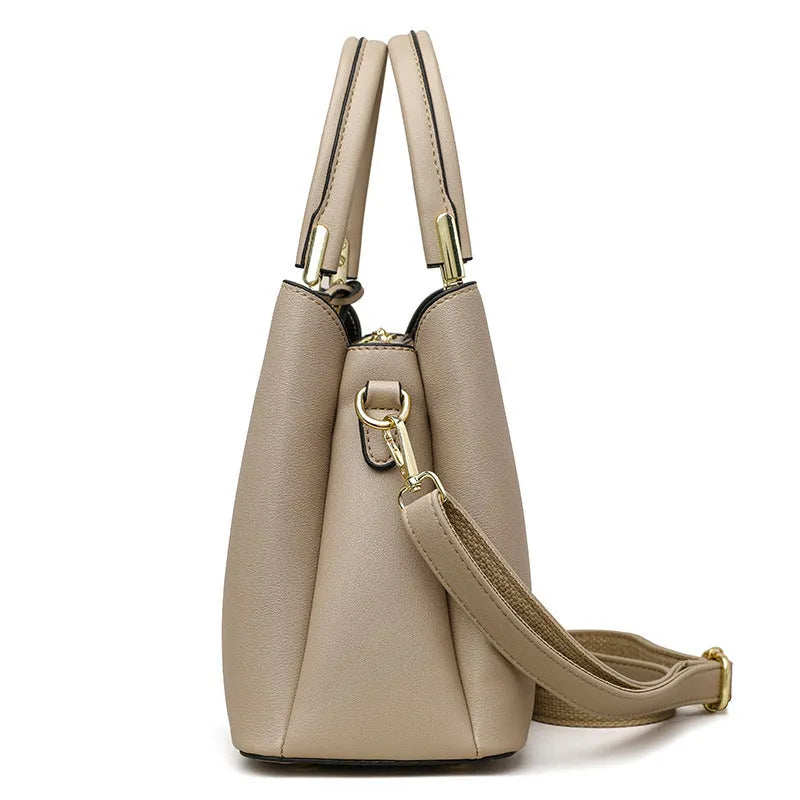 Women's multi-layer shoulder messenger bag in PU material showing compartment design