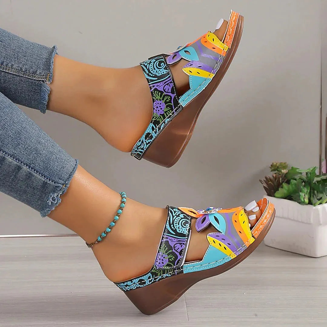 Coloured slope heel totem sandals with cowhide uppers in black, orange, purple and green options