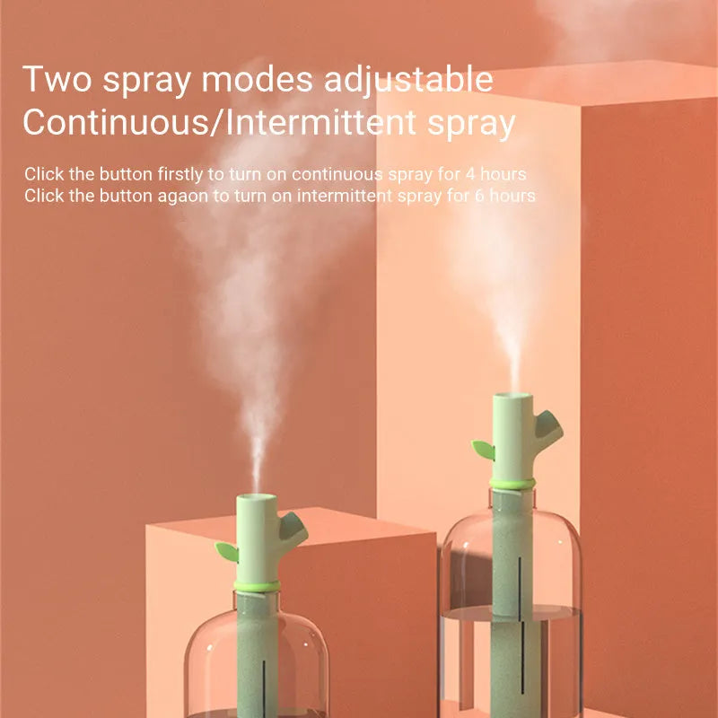 Transparent portable USB air humidifier with adjustable mist settings on a desk
