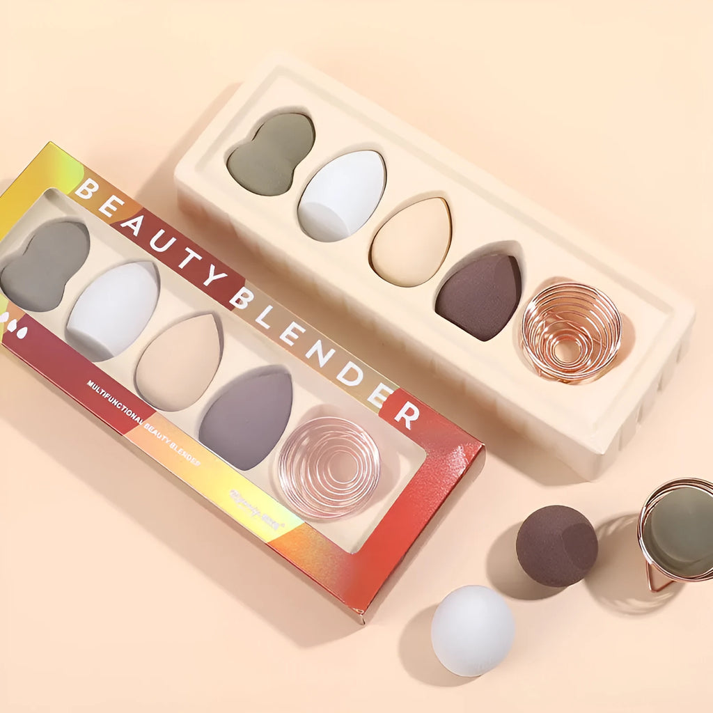 Four coloured hydrophilic polyurethane beauty eggs placed on a metal stand for makeup application