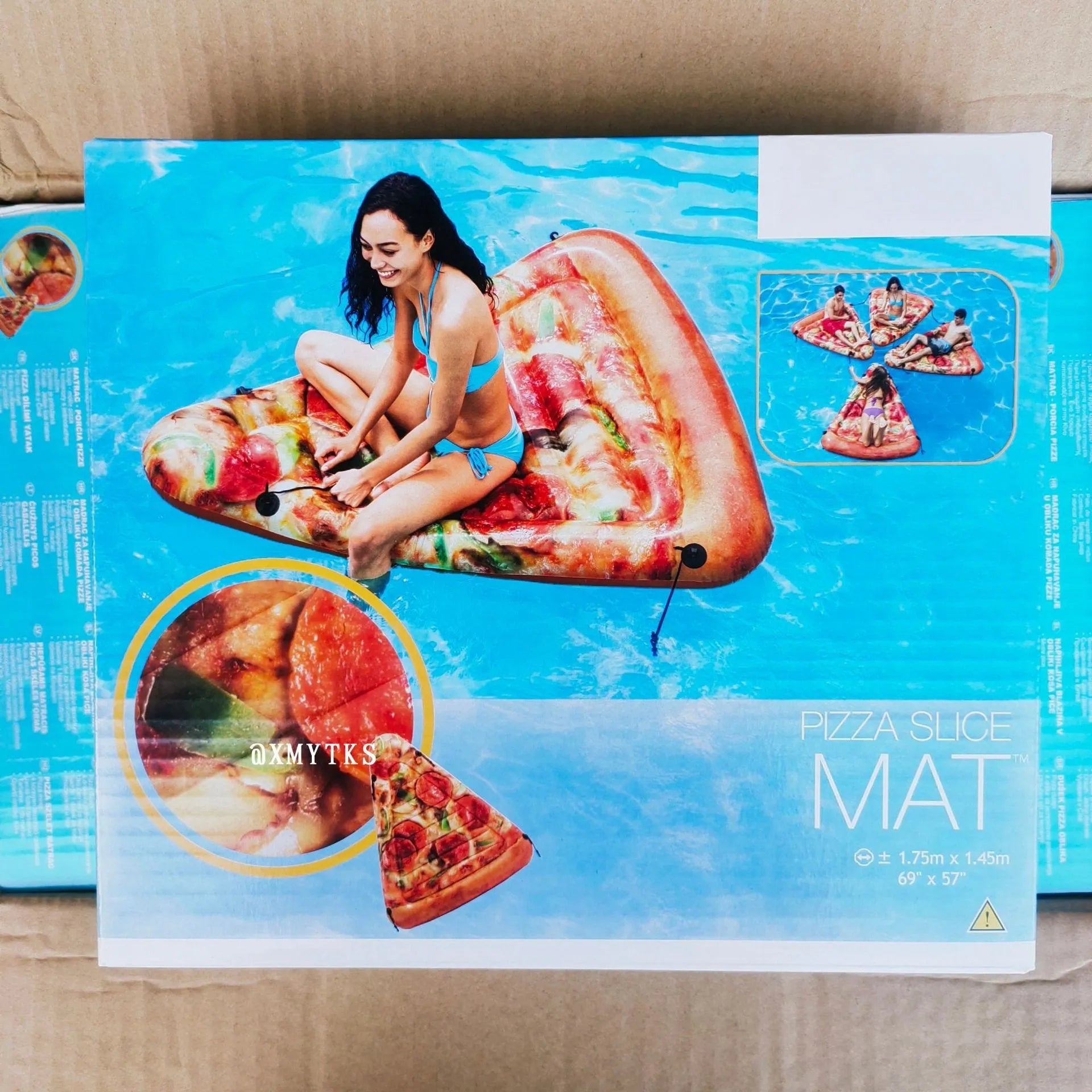Large inflatable pizza slice surfboard recliner for swimming pool lounging