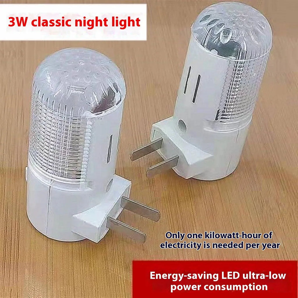 White minimalist plug-in bedside night light with dual colour switch showing 6.5cm cube dimensions